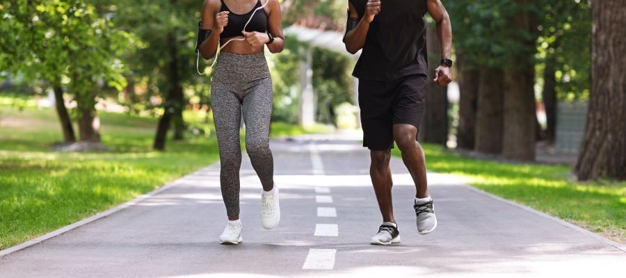 Image of two people going for a jog in the morning.