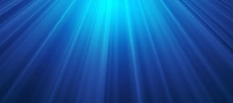 An abstract image of blue rays.
